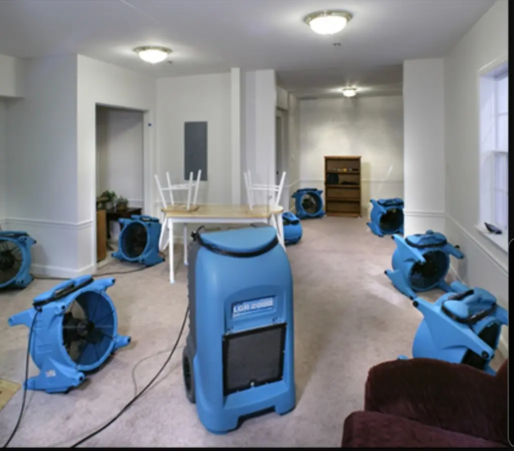 Air movers and dehumidifier setup for Water Damage Restoration in Marshalltown